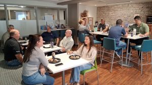 A gathering at Ramaker's Madison office.